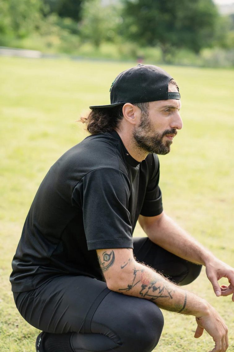 Nader Marwani coaching outdoors in Bangkok